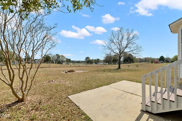 a view of a lake with a yard