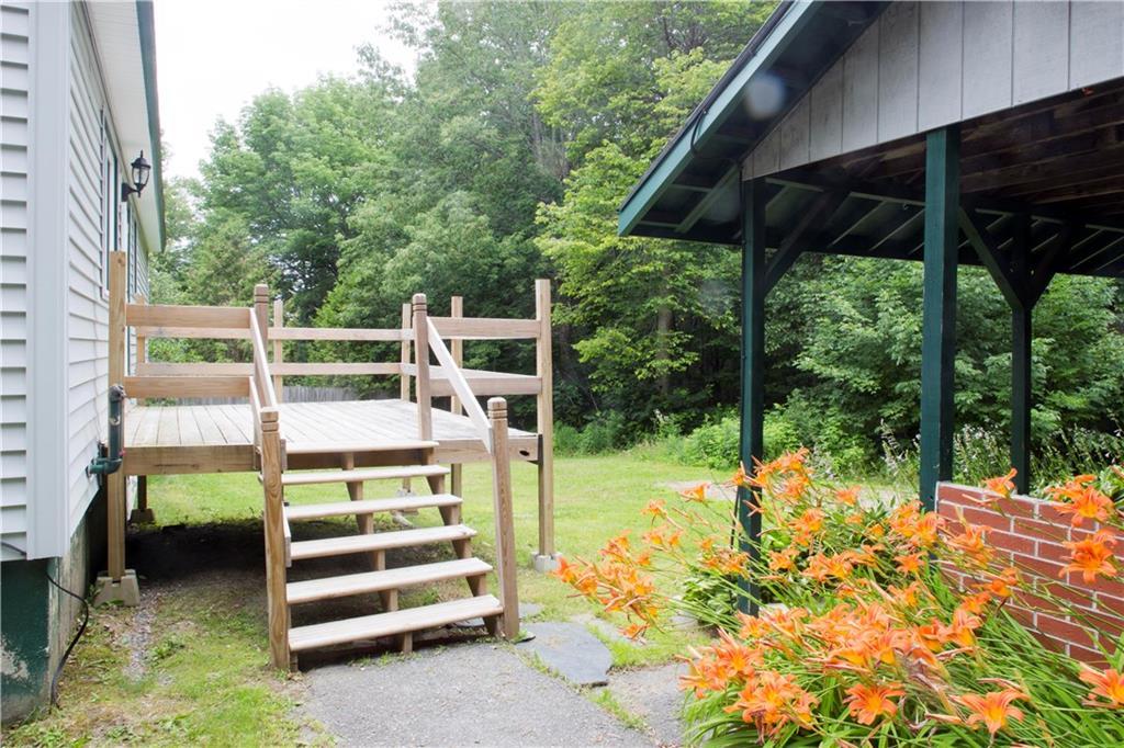 167 Phillips Road Glenburn, ME 04401 - Photo 4 of 26 Backyard deck off kitchen
