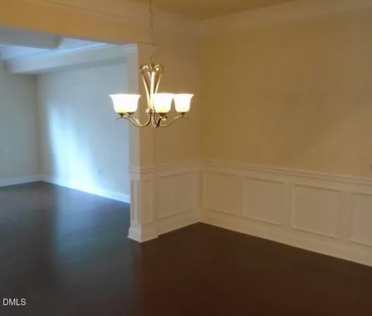 a view of a livingroom with wooden floor