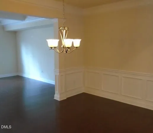 a view of a livingroom with wooden floor