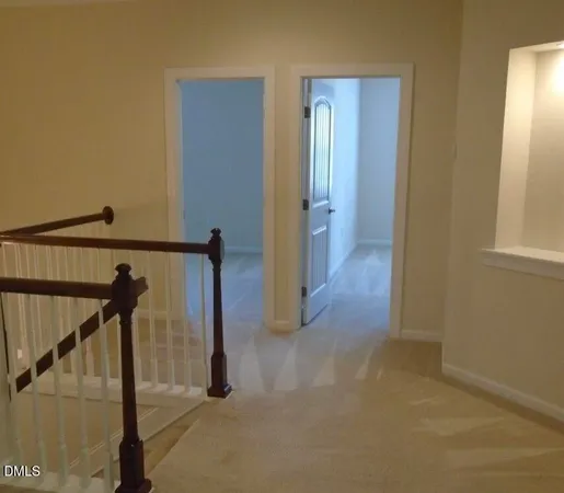 a view of a hallway with closet