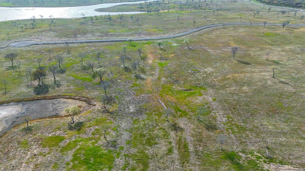 Lot 82 Bauer Boulevard Corsicana, TX 75109 - Photo 11 of 36 a bathroom with a shower