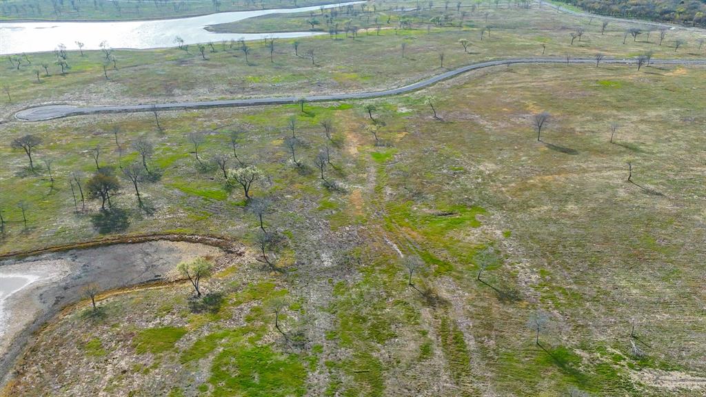 Lot 82 Bauer Boulevard Corsicana, TX 75109 - Photo 34 of 36 a bathroom with a shower