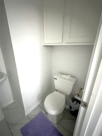 a bathroom with a toilet