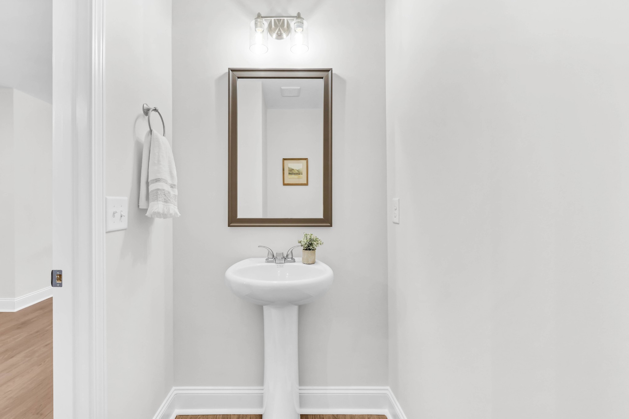 131 Quarry Point Drive, Unit C131 Clarksville, TN 37043 - Photo 11 of 33 a bathroom with a sink and mirror