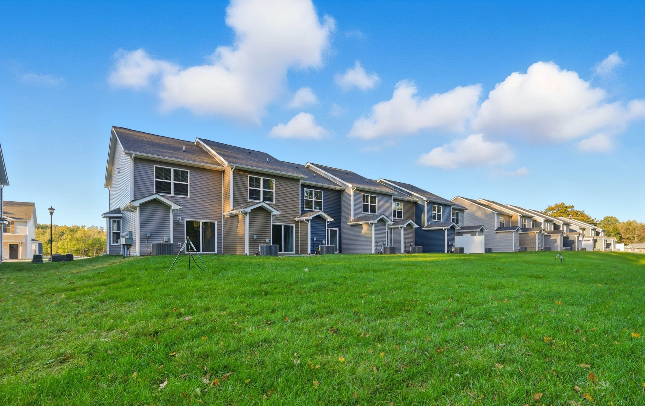 131 Quarry Point Drive, Unit C131 Clarksville, TN 37043 - Photo 33 of 33 a big house with a big yard and large trees