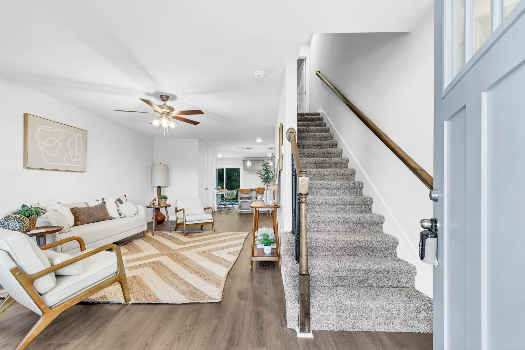131 Quarry Point Drive, Unit C131 Clarksville, TN 37043 - Photo 5 of 33 a living room with furniture and wooden floor