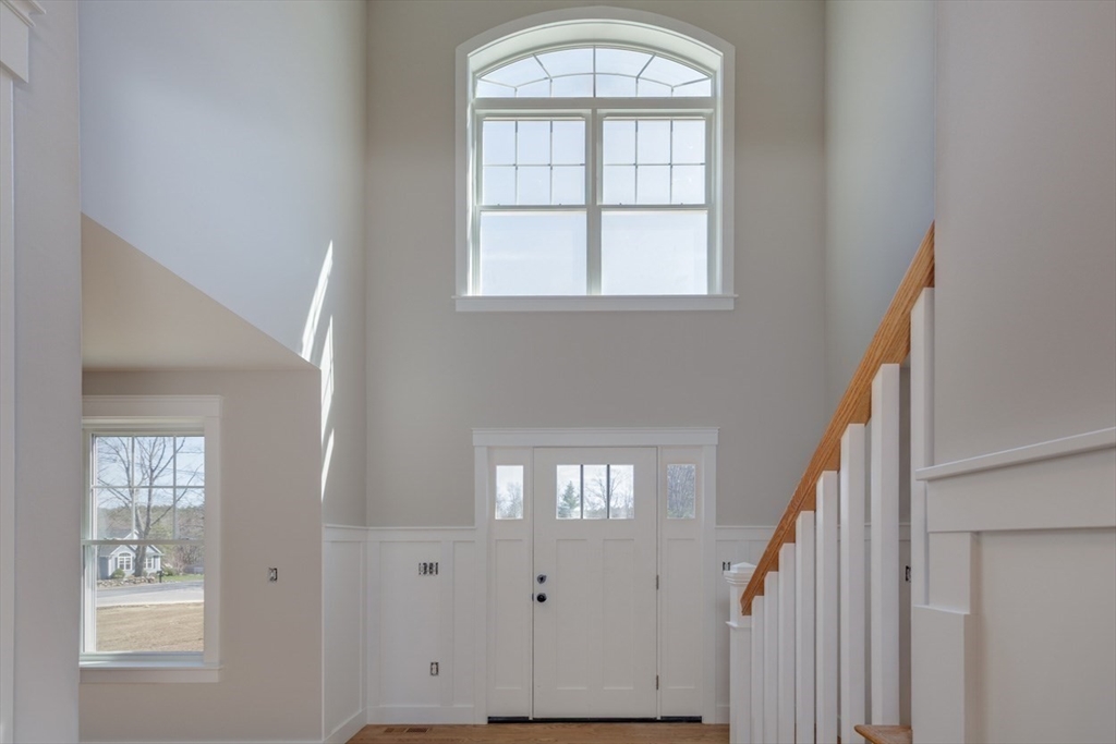 4 Haystack Circle Pelham, NH 03076 - Photo 13 of 39 a view of an entryway with wooden floor