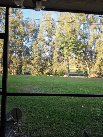 a kitchen with a sink a stove and cabinets