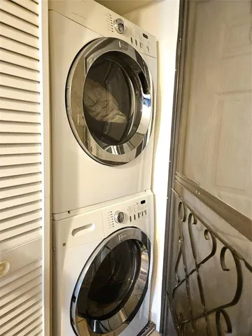 a bathroom with a toilet a sink and a mirror