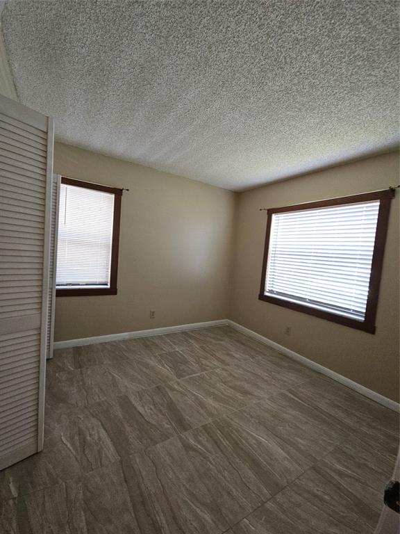 10601 Northwest 11th Street, Unit 10601 Hollywood, FL 33026 - Photo 8 of 9 an empty room with window