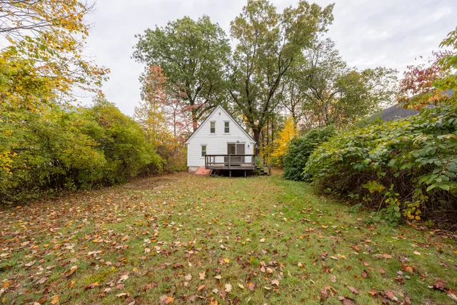 a house with trees in front of it