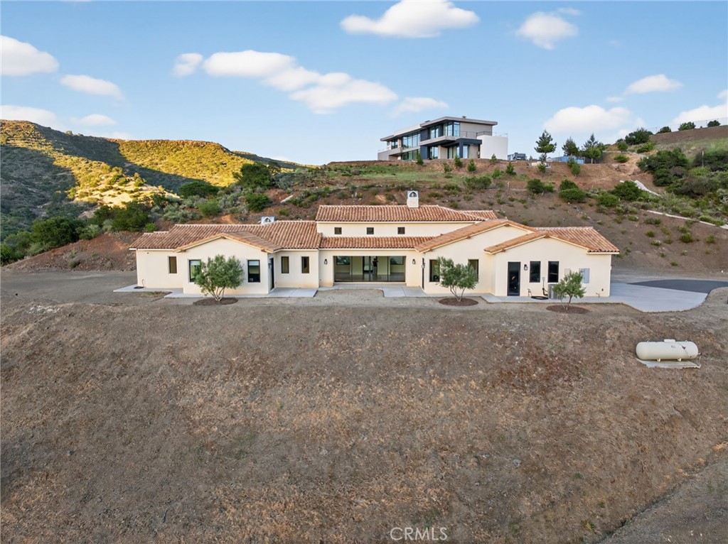 43754 De Luz Road Temecula, CA 92590 - Photo 20 of 75 a front view of a house with a yard