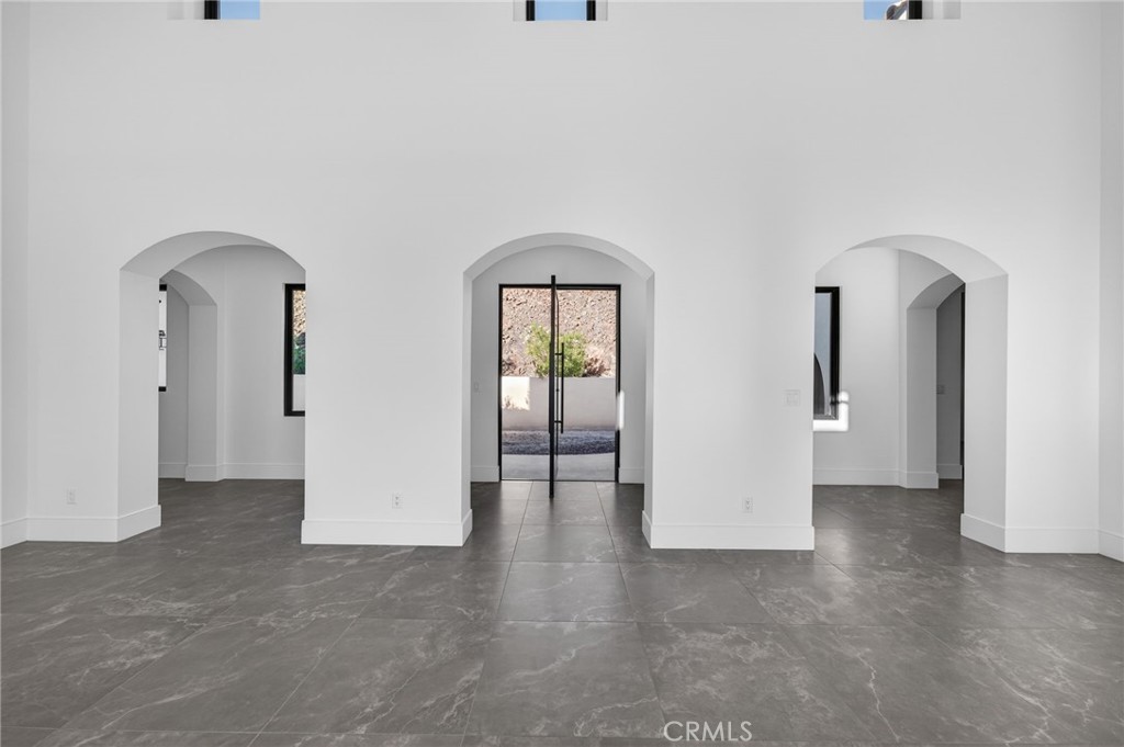 43754 De Luz Road Temecula, CA 92590 - Photo 29 of 74 a view of a big room with closet and wooden floor