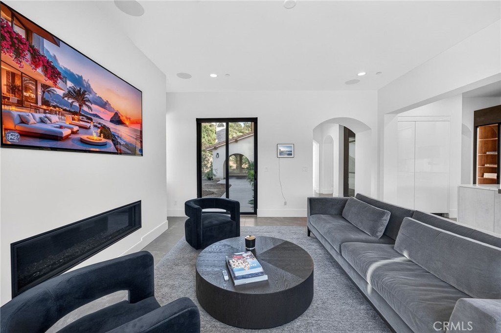 43754 De Luz Road Temecula, CA 92590 - Photo 39 of 74 a living room with furniture and a rug