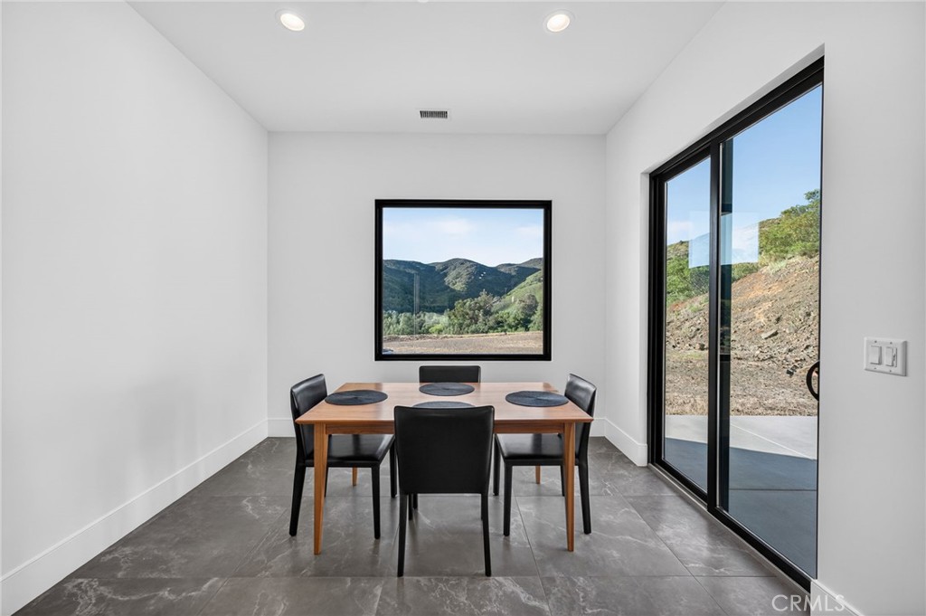43754 De Luz Road Temecula, CA 92590 - Photo 48 of 74 a view of a dining room with furniture large window and outside view