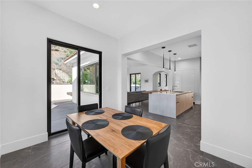 43754 De Luz Road Temecula, CA 92590 - Photo 49 of 74 a view of a dining room with furniture and window