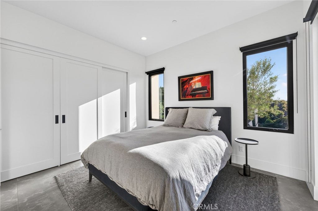 43754 De Luz Road Temecula, CA 92590 - Photo 57 of 74 a bedroom with a bed and a window