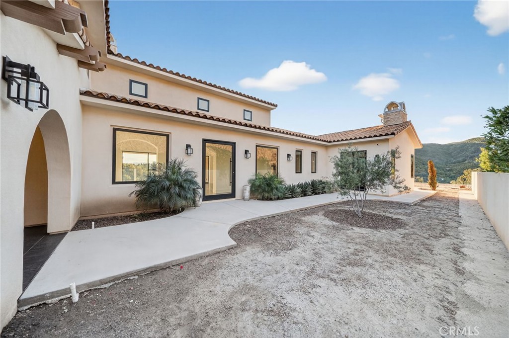 43754 De Luz Road Temecula, CA 92590 - Photo 7 of 75 a view of a house with a yard