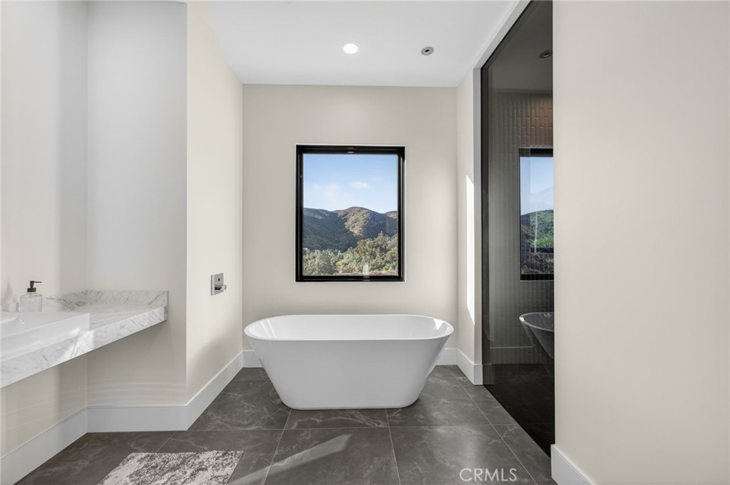 43754 De Luz Road Temecula, CA 92590 - Photo 72 of 74 a view of a bathtub in a bathroom