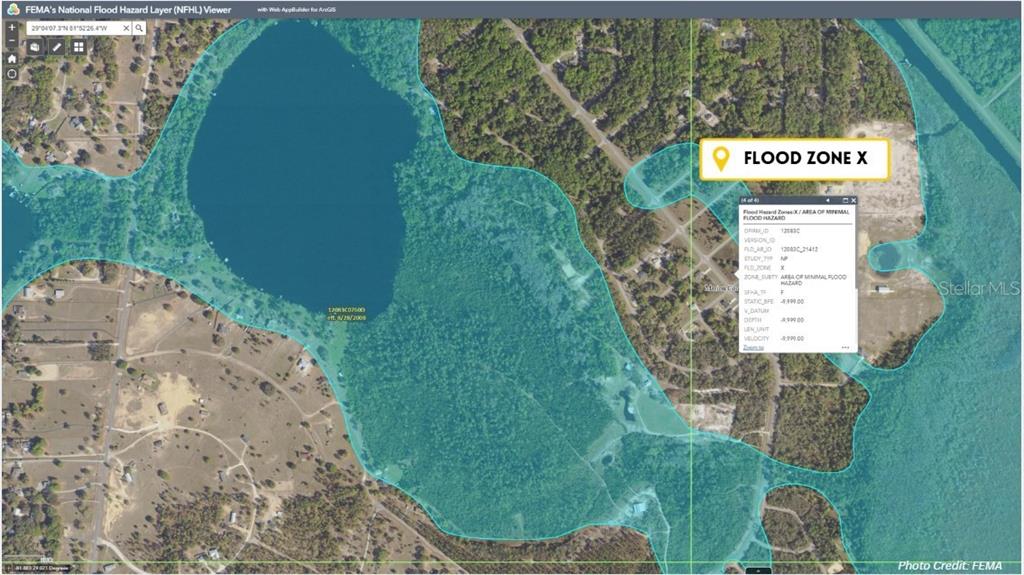 Tbd Tbd Corner Road Ocklawaha, FL 32179 - Photo 6 of 12 an aerial view of a residential houses with outdoor space and trees all around