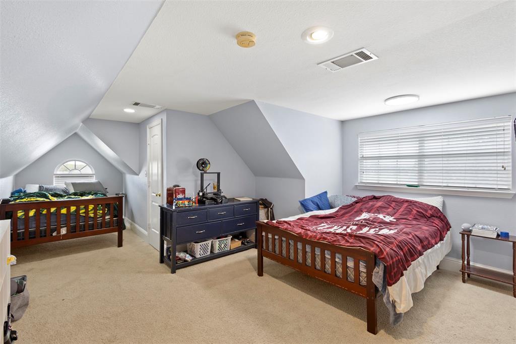 2000 Pin Oak Drive Kaufman, TX 75142 - Photo 27 of 40 a bed room with a bed and a window