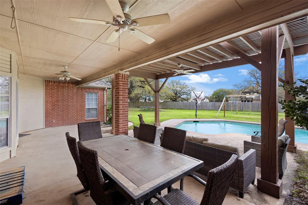 2000 Pin Oak Drive Kaufman, TX 75142 - Photo 31 of 40 a view of an outdoor dining space with furniture