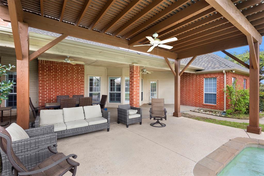 2000 Pin Oak Drive Kaufman, TX 75142 - Photo 33 of 40 a living room with furniture and a large window