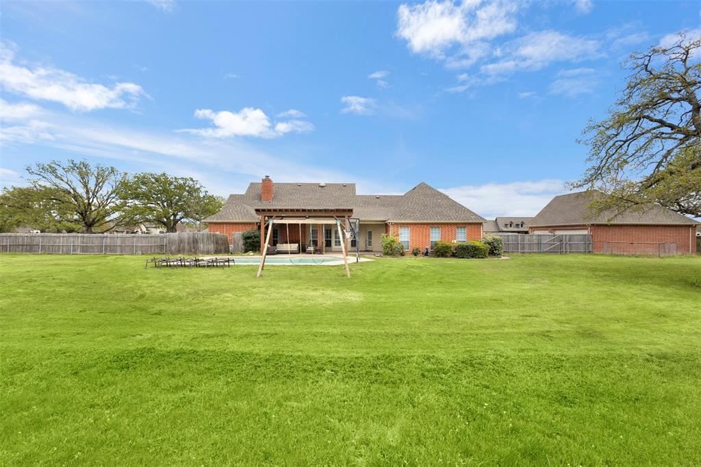 2000 Pin Oak Drive Kaufman, TX 75142 - Photo 39 of 40 a front view of a house with garden