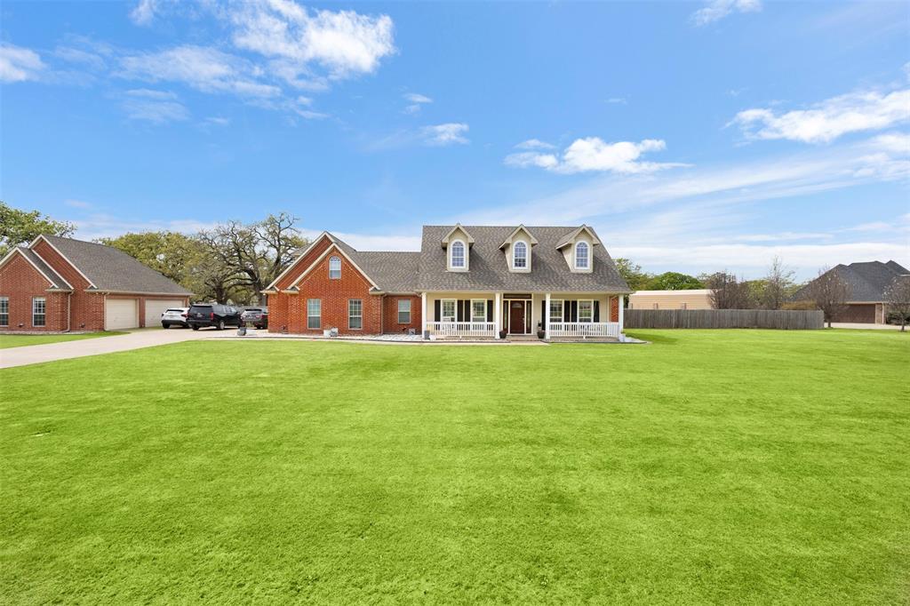 2000 Pin Oak Drive Kaufman, TX 75142 - Photo 40 of 40 a front view of a house with garden