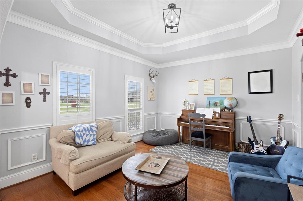 2000 Pin Oak Drive Kaufman, TX 75142 - Photo 6 of 40 a living room with furniture and wooden floor
