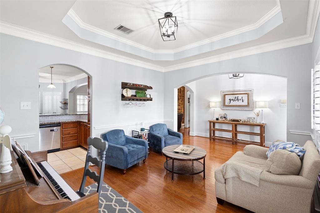 2000 Pin Oak Drive Kaufman, TX 75142 - Photo 7 of 40 a living room with furniture and wooden floor