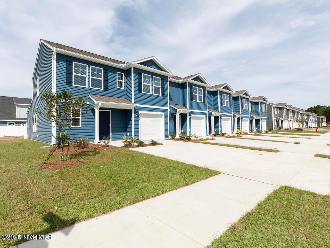 7058 Dunford Road, Unit 124 Leland, NC 28451 - Photo 2 of 41 similar townhome for illustrative purposes only. actual townhome will vary in colors and options.
