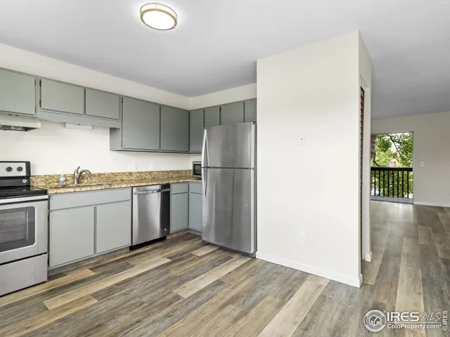 a bedroom with a bed and ceiling fan