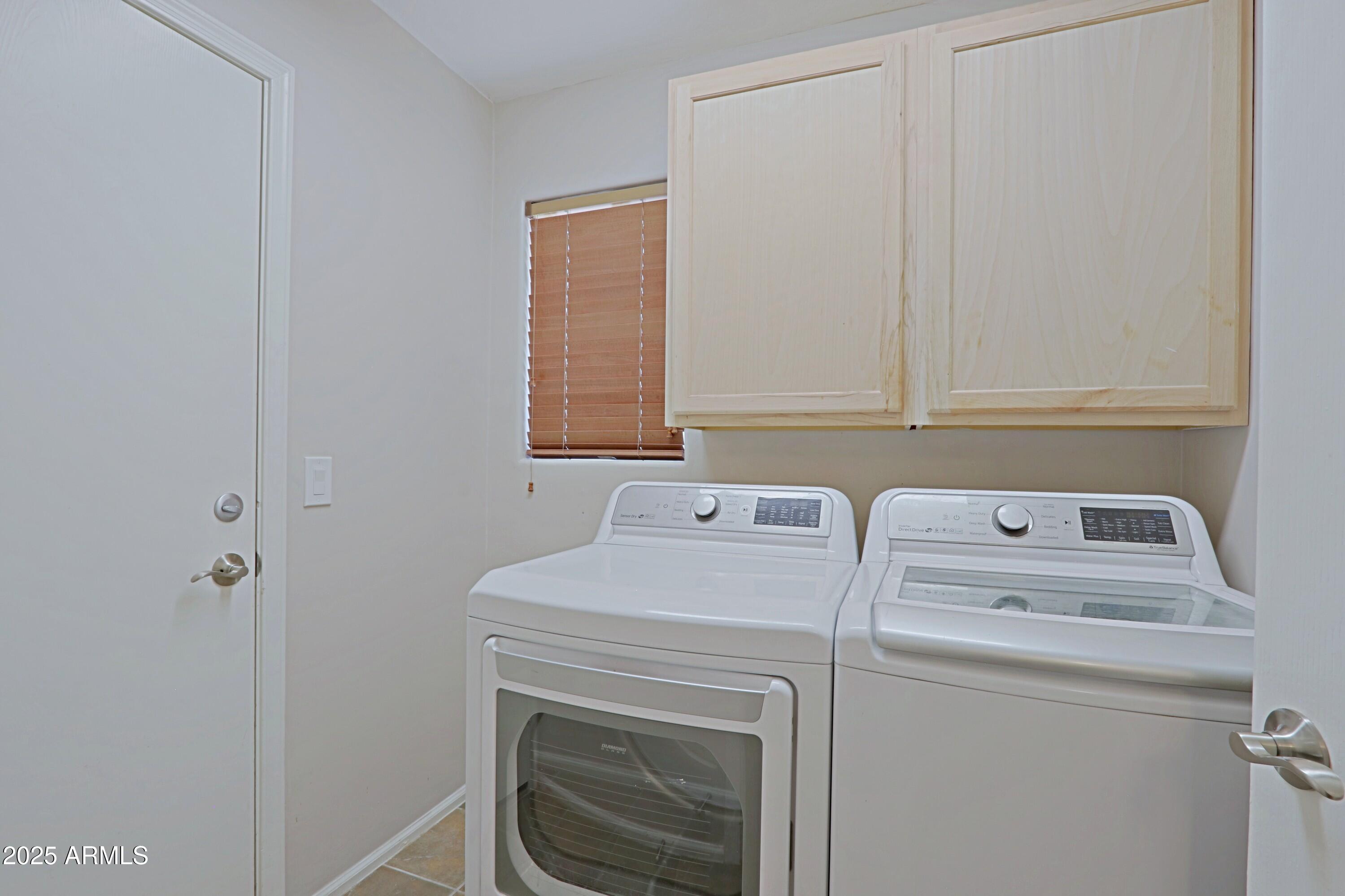 42812 West Venture Road Maricopa, AZ 85138 - Photo 23 of 58 a utility room with dryer and washer