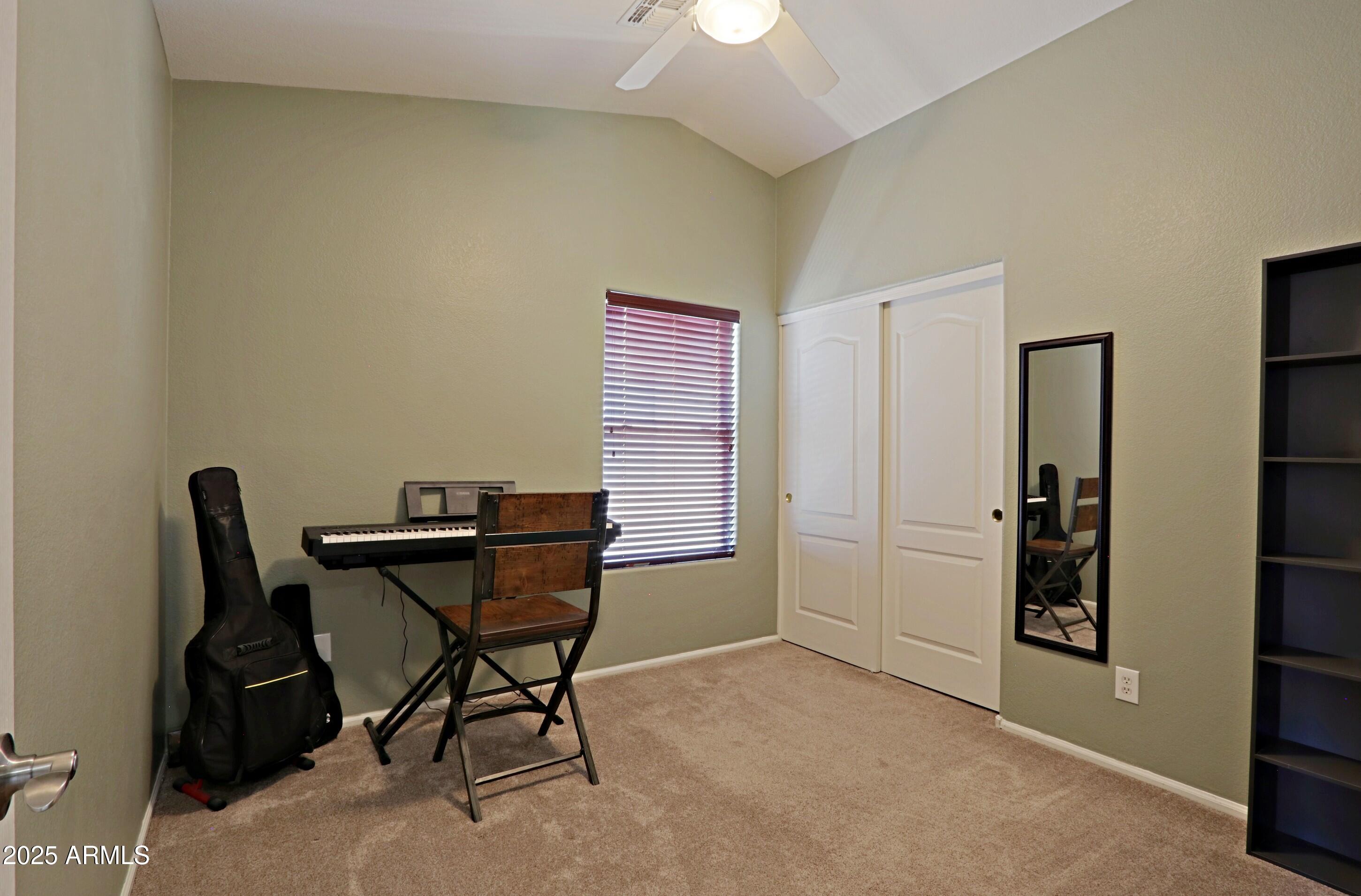 42812 West Venture Road Maricopa, AZ 85138 - Photo 33 of 58 a work room with furniture and musical instruments