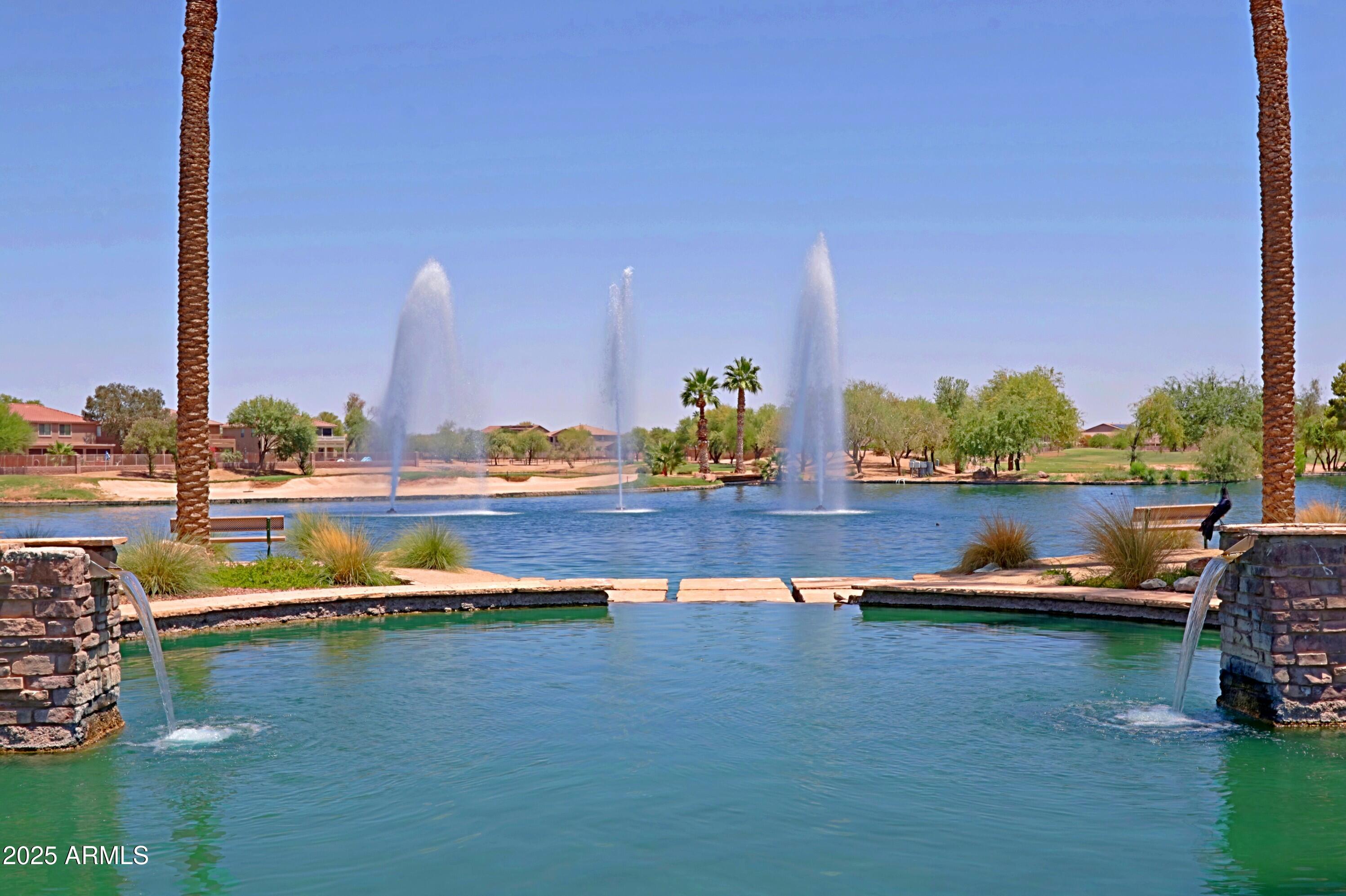 42812 West Venture Road Maricopa, AZ 85138 - Photo 54 of 58 a view of a lake with outdoor space