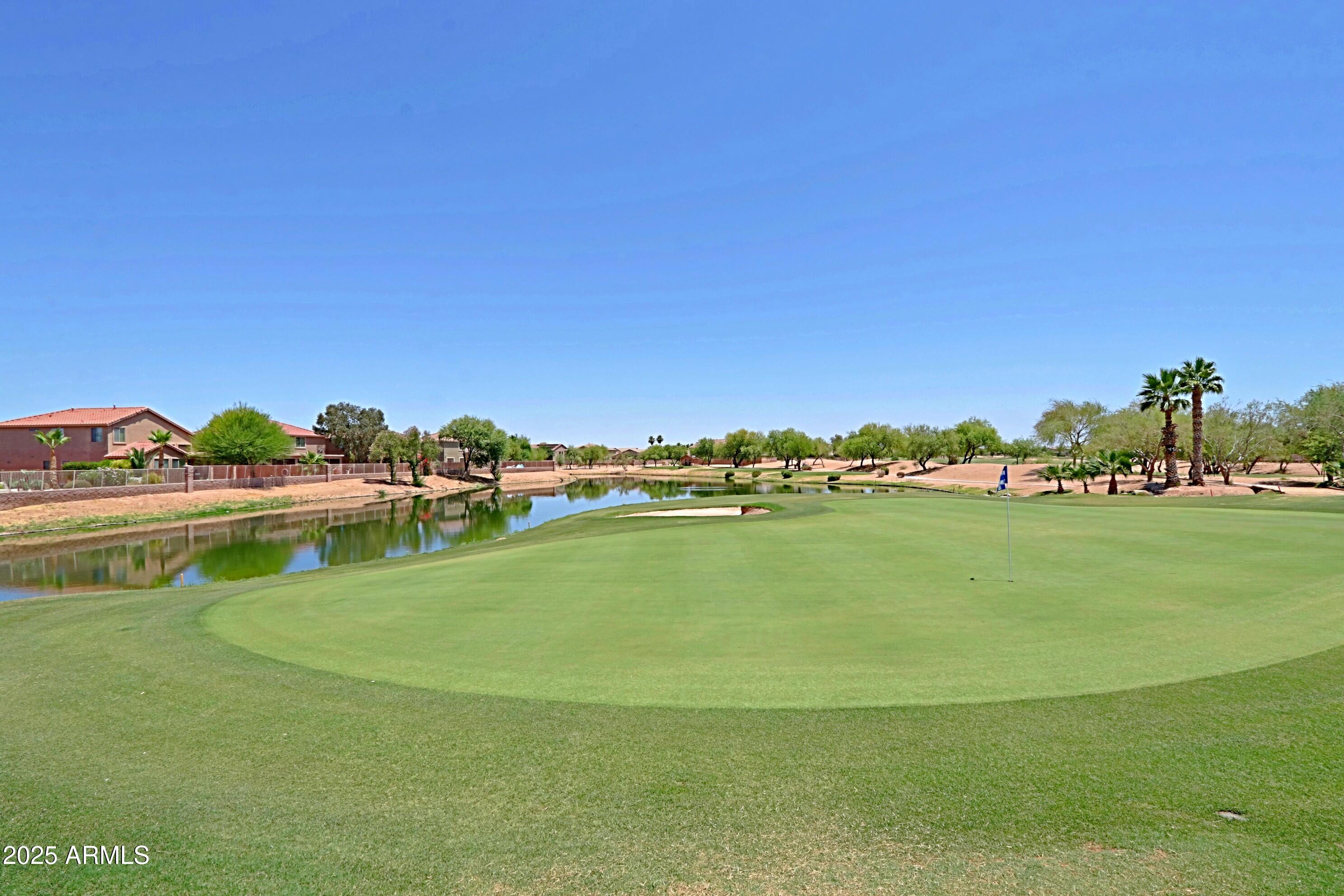 42812 West Venture Road Maricopa, AZ 85138 - Photo 56 of 58 a view of an ocean with boats and trees in the background