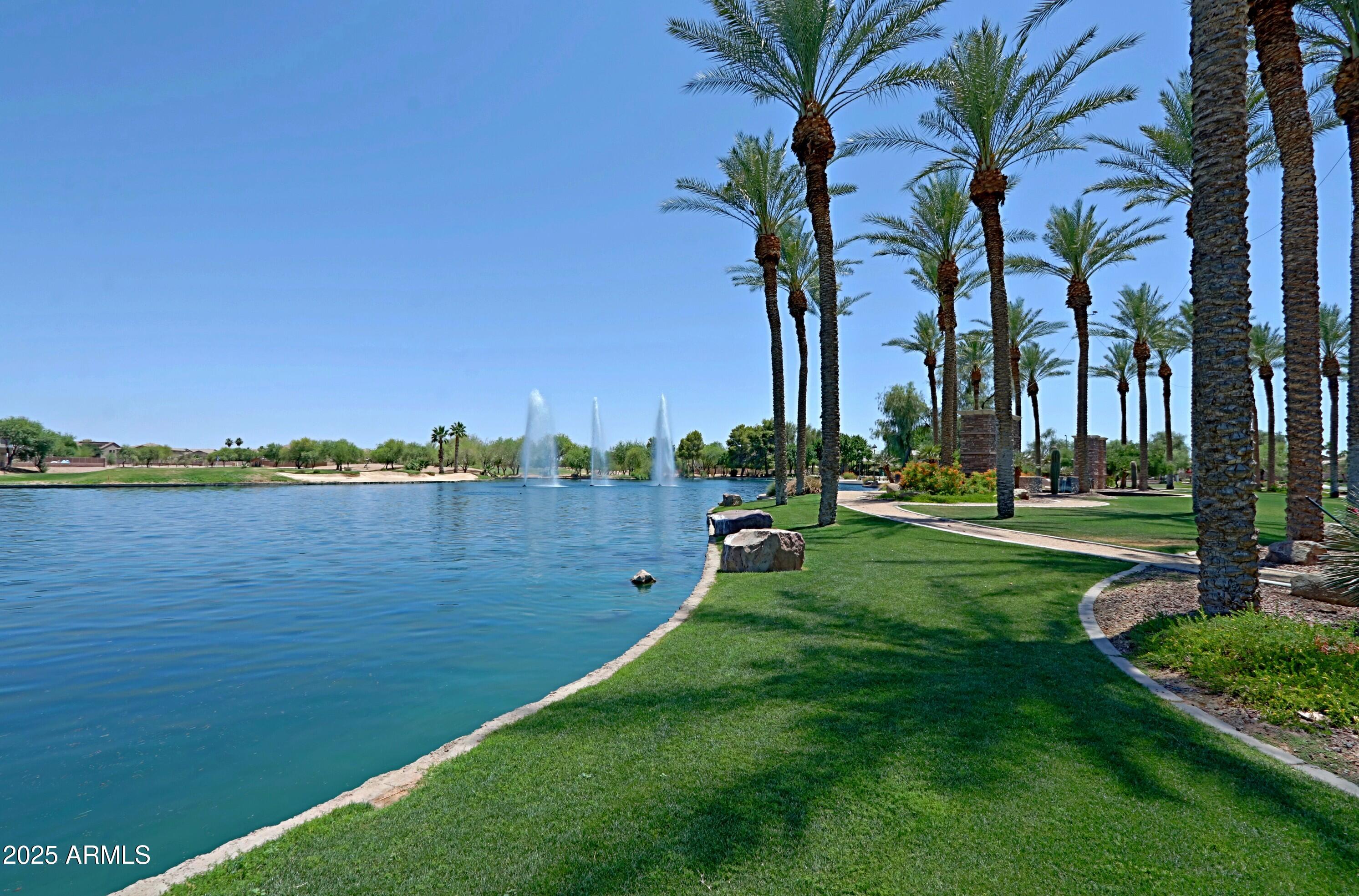 42812 West Venture Road Maricopa, AZ 85138 - Photo 58 of 58 a view of a lake and a yard
