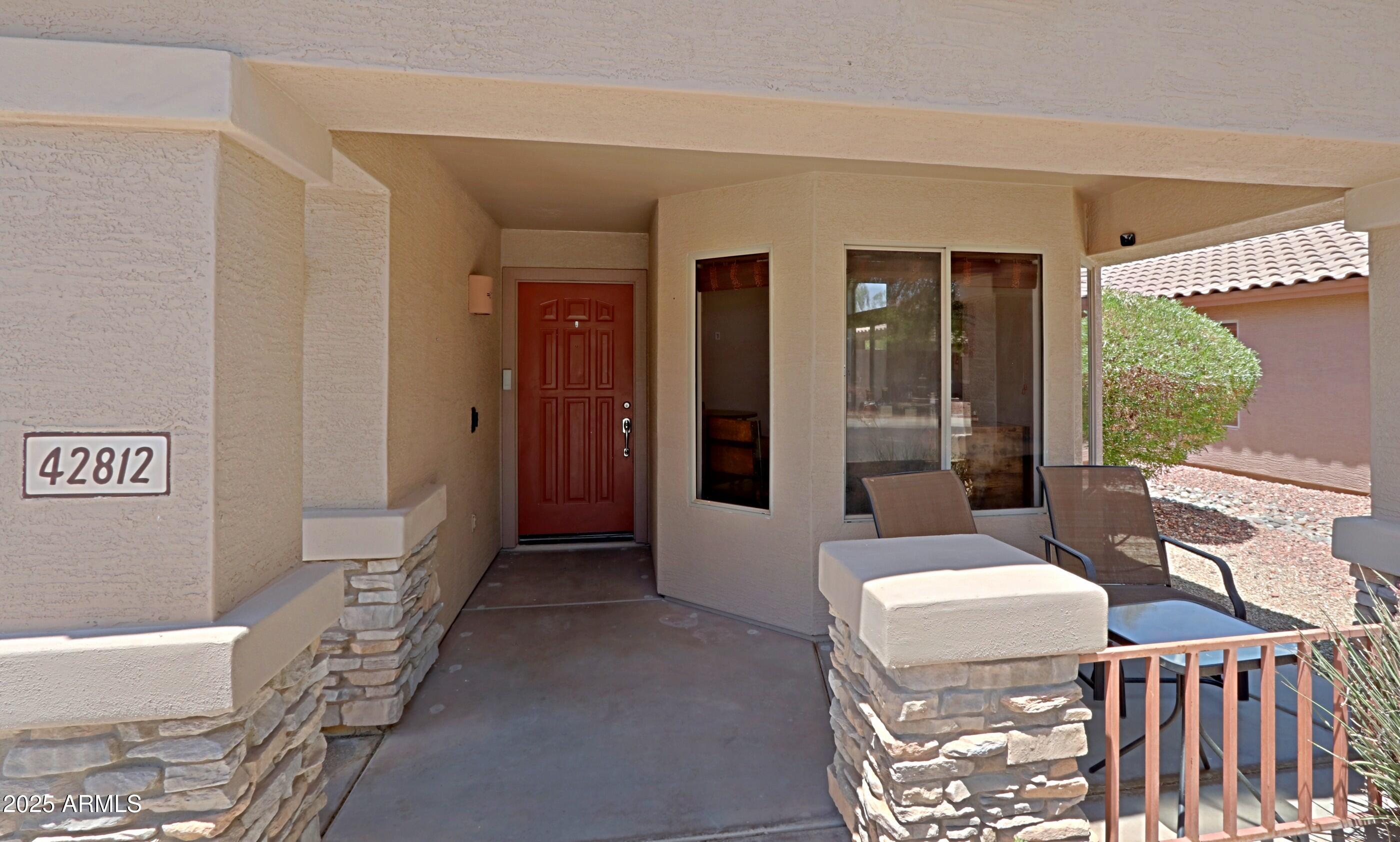 42812 West Venture Road Maricopa, AZ 85138 - Photo 7 of 58 a living room with furniture
