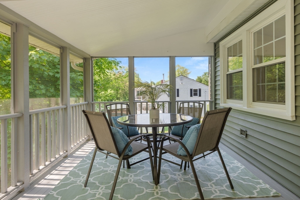11 Longmeadow Road Medfield, MA 02052 - Photo 26 of 39 a view of a dining room with furniture large windows and wooden floor