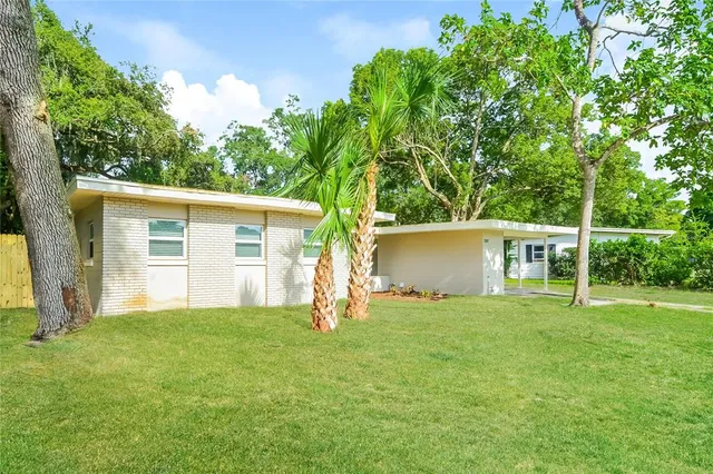 front view of a house with a yard