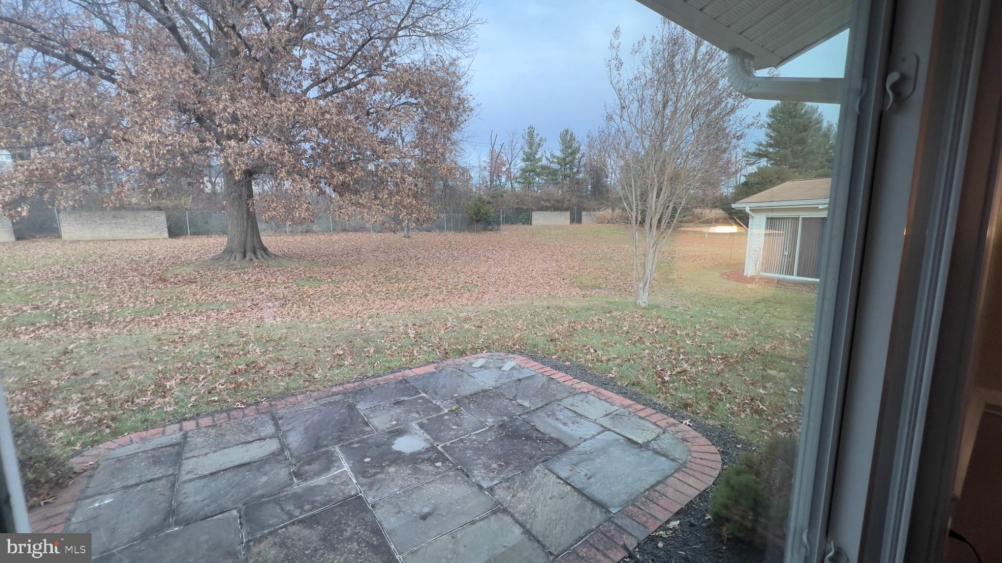3525 Tarkington Lane, Unit 63B Silver Spring, MD 20906 - Photo 22 of 36 a view of a yard with large trees