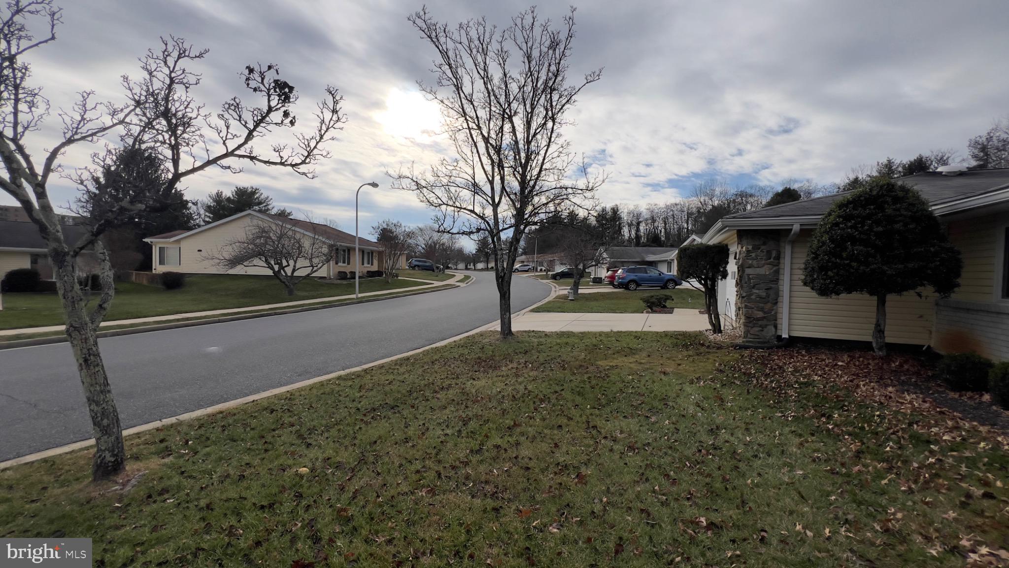 3525 Tarkington Lane, Unit 63B Silver Spring, MD 20906 - Photo 29 of 36 a view of street with parked cars