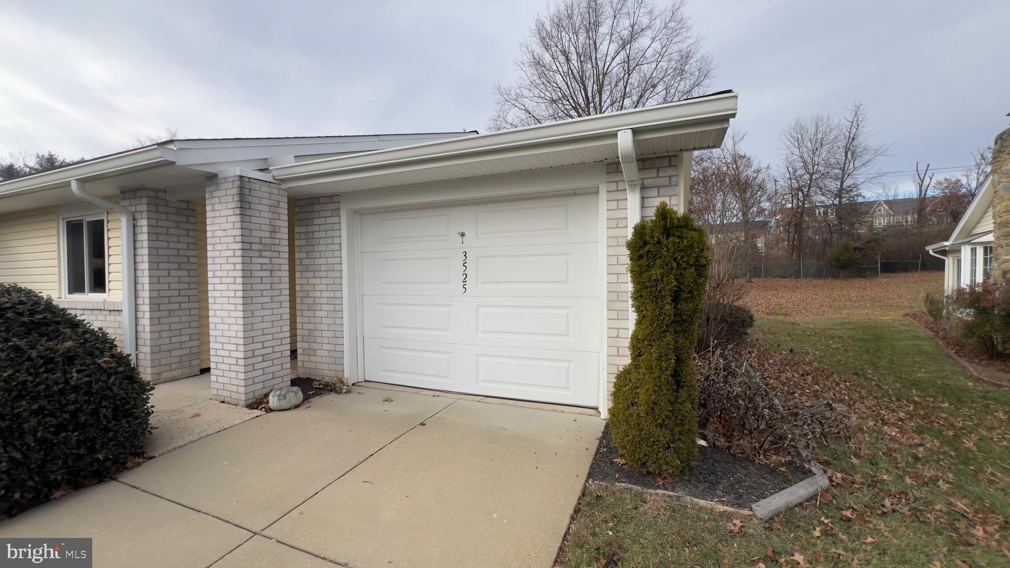 3525 Tarkington Lane, Unit 63B Silver Spring, MD 20906 - Photo 31 of 36 a view of a house with a yard