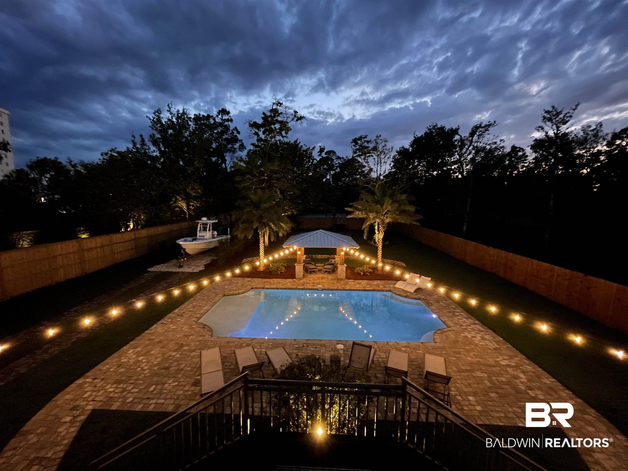 4795 Holder Road Orange Beach, AL 36561 - Photo 37 of 39 Backyard Pool at Night