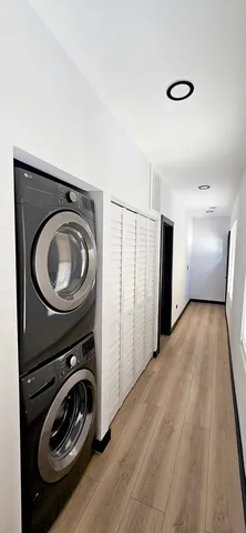 a view of a storage & utility room with washer and dryer