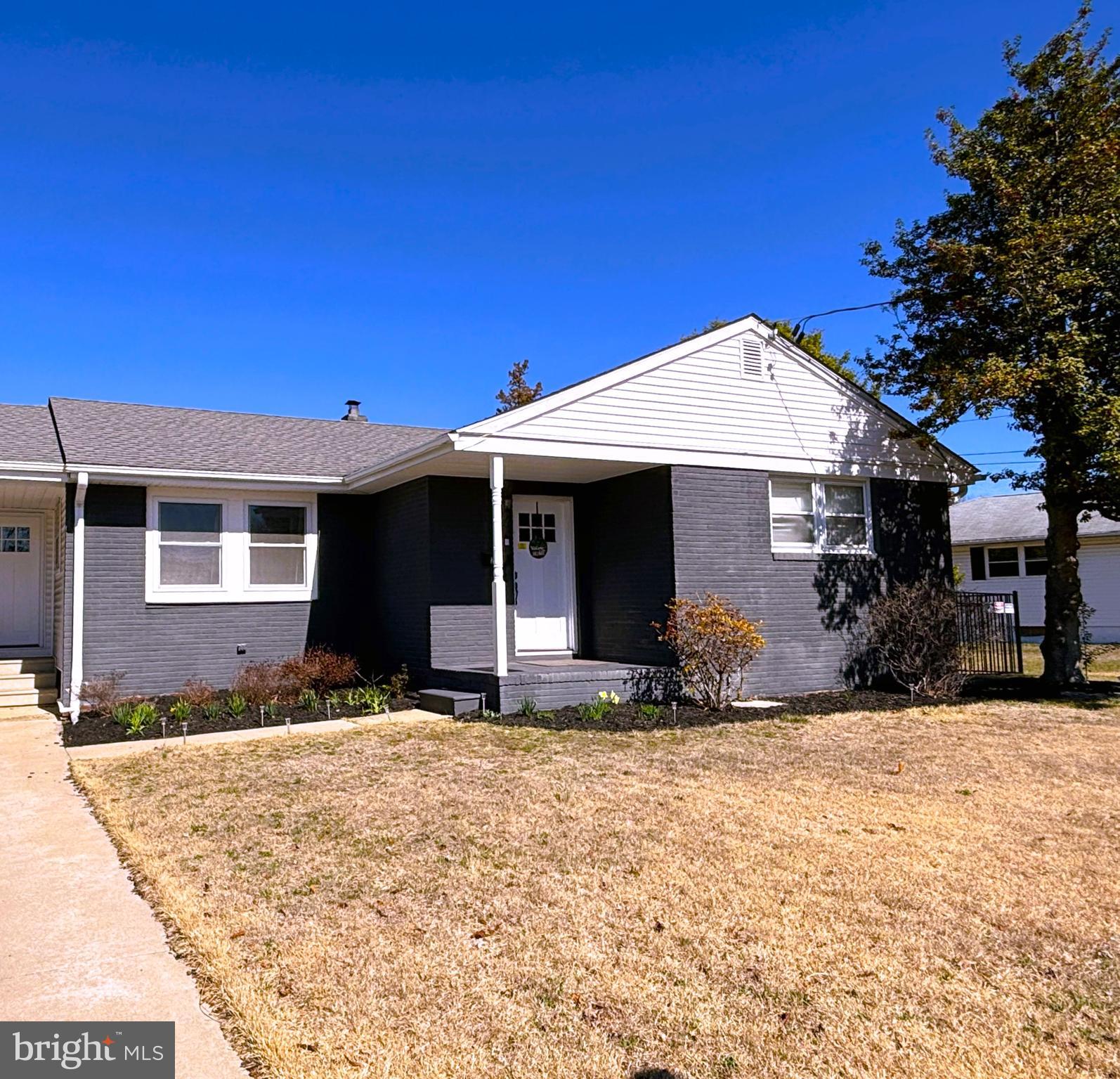 205 Lucas Avenue West Berlin, NJ 08091 - Photo 1 of 25 a front view of a house with a yard
