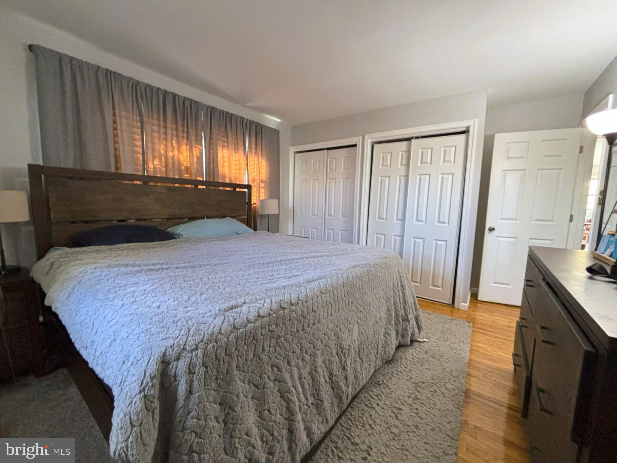 205 Lucas Avenue West Berlin, NJ 08091 - Photo 16 of 25 a bedroom with a bed and a large mirror on the dresser