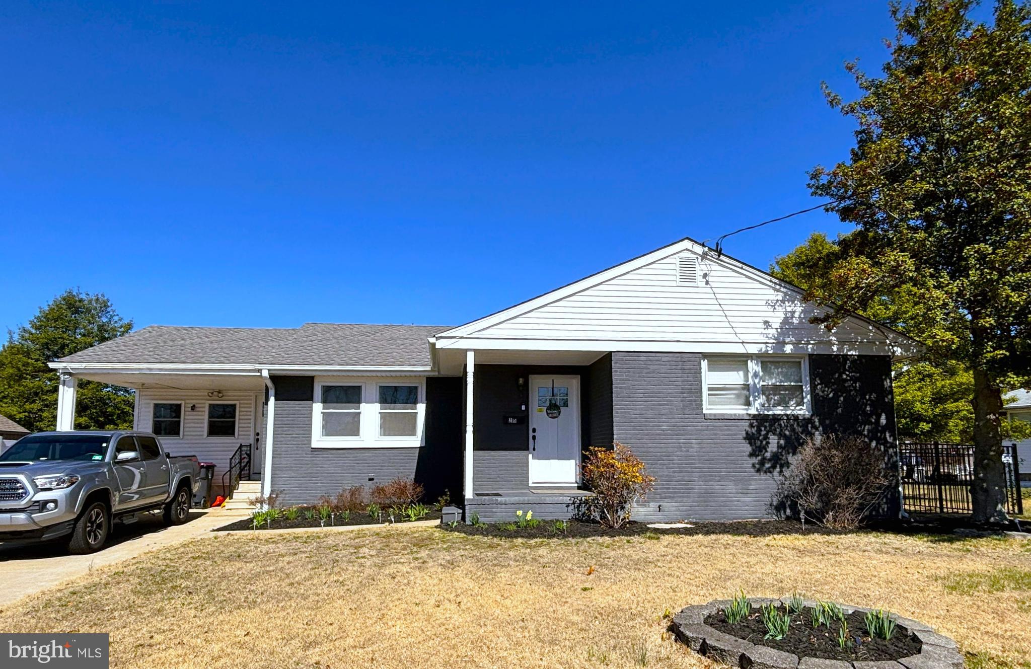 205 Lucas Avenue West Berlin, NJ 08091 - Photo 2 of 25 a front view of a house with a yard
